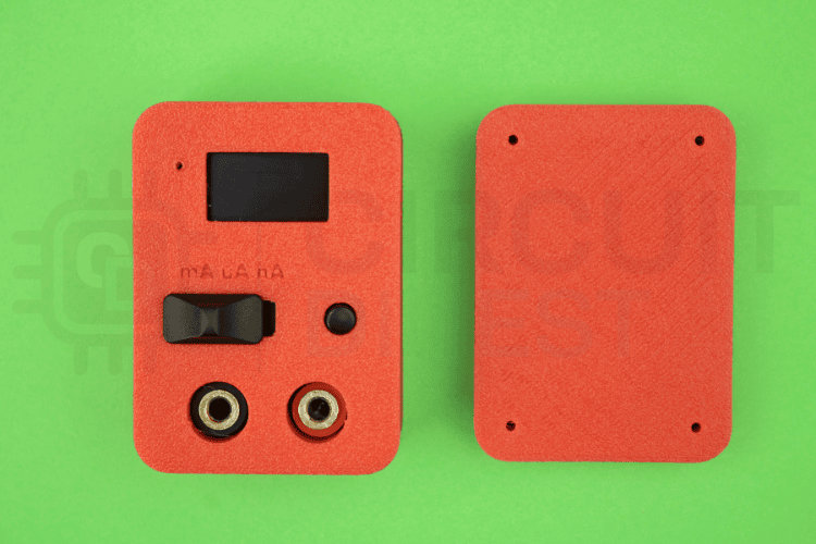 Front view of assembled enclosure with OLED display visible, switch caps installed, showing professional finish of ampere meter DC digital