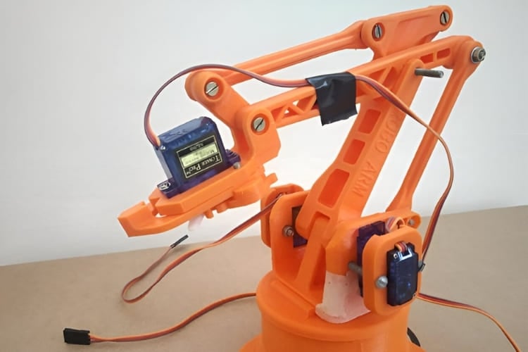 4-DOF pick and place robotic arm controlled by LPC2148 ARM7 microcontroller with potentiometer manual input