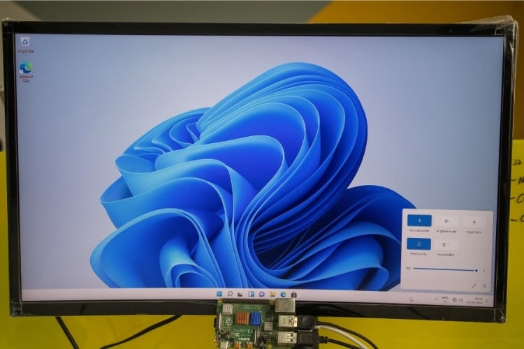 Raspberry Pi running Windows 11 with USB ethernet adapter showing WiFi limitation workaround